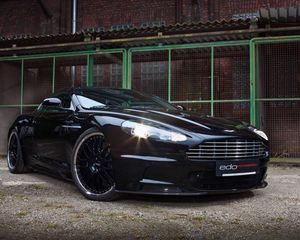 Preview wallpaper aston martin, dbs, 2010, black, front view, sports, building