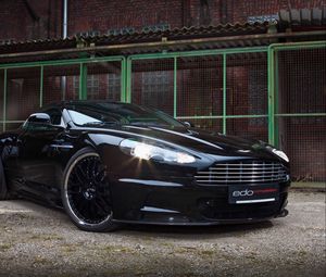 Preview wallpaper aston martin, dbs, 2010, black, front view, sports, building