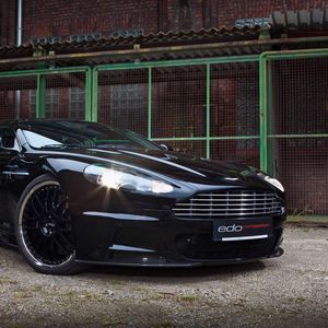 Preview wallpaper aston martin, dbs, 2010, black, front view, sports, building