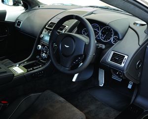 Preview wallpaper aston martin, dbs, 2010, black, salon, interior, steering wheel, speedometer