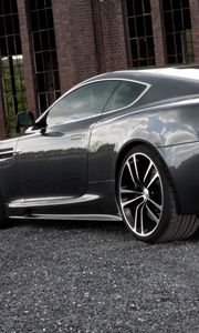 Preview wallpaper aston martin, dbs, 2010, black, side view, style, building