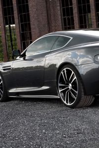 Preview wallpaper aston martin, dbs, 2010, black, side view, style, building