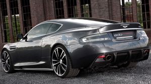 Preview wallpaper aston martin, dbs, 2010, black, side view, style, building