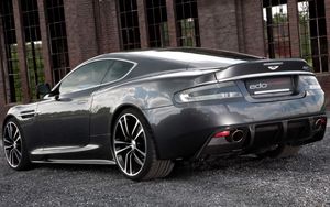 Preview wallpaper aston martin, dbs, 2010, black, side view, style, building