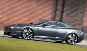 Preview wallpaper aston martin, dbs, 2010, gray, side view, style, grass