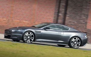 Preview wallpaper aston martin, dbs, 2010, gray, side view, style, grass