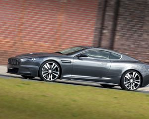 Preview wallpaper aston martin, dbs, 2010, gray, side view, style, grass