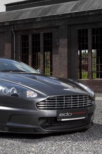 Preview wallpaper aston martin, dbs, 2010, gray metallic, front view, cars, building