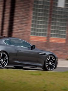 Preview wallpaper aston martin, dbs, 2010, gray, side view, cars, grass, building