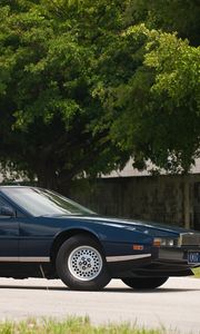 Preview wallpaper aston martin, lagonda, 1976, blue, side view, cars, nature