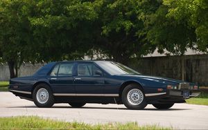 Preview wallpaper aston martin, lagonda, 1976, blue, side view, cars, nature