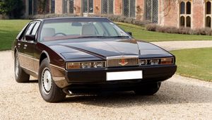 Preview wallpaper aston martin, lagonda, 1976, cherry, front view, style, building