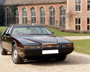 Preview wallpaper aston martin, lagonda, 1976, cherry, front view, style, building