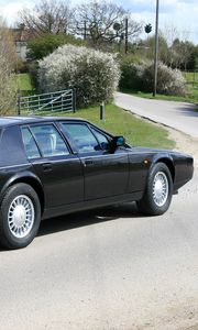 Preview wallpaper aston martin, lagonda, 1987, black, side view, cars, nature