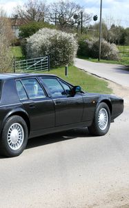 Preview wallpaper aston martin, lagonda, 1987, black, side view, cars, nature