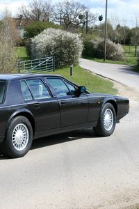 Preview wallpaper aston martin, lagonda, 1987, black, side view, cars, nature