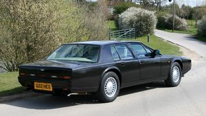 Preview wallpaper aston martin, lagonda, 1987, black, side view, cars, nature