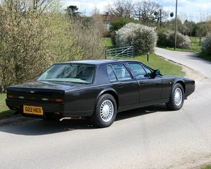 Preview wallpaper aston martin, lagonda, 1987, black, side view, cars, nature