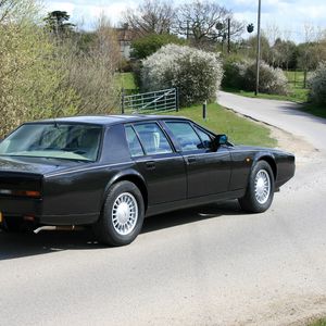 Preview wallpaper aston martin, lagonda, 1987, black, side view, cars, nature