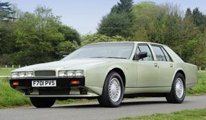 Preview wallpaper aston martin, lagonda, 1987, green, front view, retro, trees