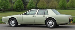 Preview wallpaper aston martin lagonda, 1987, green, side view, cars, sky, grass