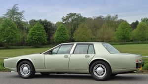 Preview wallpaper aston martin lagonda, 1987, green, side view, cars, sky, grass