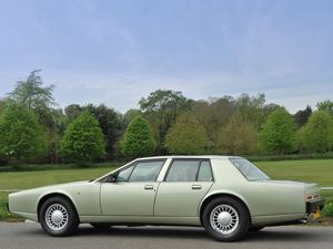 Preview wallpaper aston martin lagonda, 1987, green, side view, cars, sky, grass