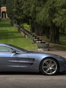 Preview wallpaper aston martin, one-77, 2009, metallic blue, side view, cars, nature