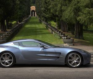 Preview wallpaper aston martin, one-77, 2009, metallic blue, side view, cars, nature