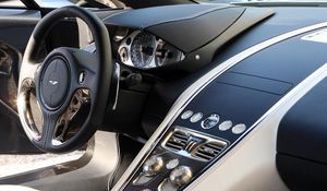 Preview wallpaper aston martin, one-77, 2009, salon, interior, steering wheel, speedometer