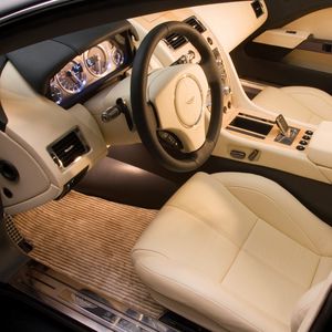 Preview wallpaper aston martin, rapide, 2006, concept car, beige, salon, interior, steering wheel, speedometer