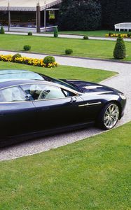 Preview wallpaper aston martin, rapide, 2006, black, side view, concept car, grass