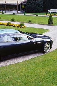 Preview wallpaper aston martin, rapide, 2006, black, side view, concept car, grass