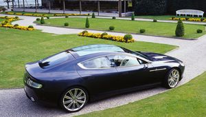 Preview wallpaper aston martin, rapide, 2006, black, side view, concept car, grass