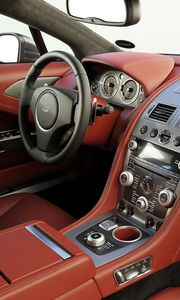 Preview wallpaper aston martin, rapide, 2009, red, salon, interior, steering wheel, speedometer