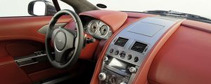 Preview wallpaper aston martin, rapide, 2009, red, salon, interior, steering wheel, speedometer