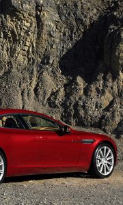 Preview wallpaper aston martin, rapide, 2009, red, side view, rock