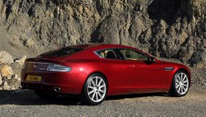 Preview wallpaper aston martin, rapide, 2009, red, side view, rock