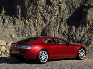 Preview wallpaper aston martin, rapide, 2009, red, side view, rock