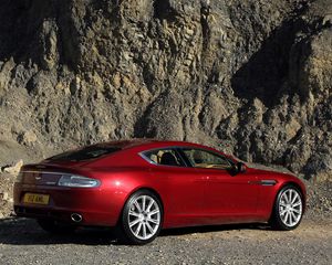 Preview wallpaper aston martin, rapide, 2009, red, side view, rock
