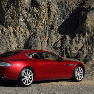 Preview wallpaper aston martin, rapide, 2009, red, side view, rock