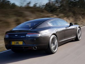 Preview wallpaper aston martin, rapide, 2009, gray, side view, rear car, speed