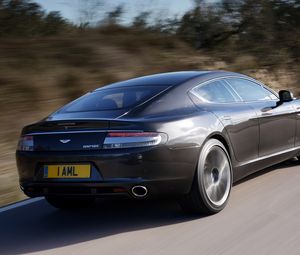 Preview wallpaper aston martin, rapide, 2009, gray, side view, rear car, speed