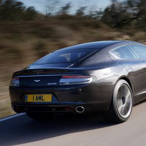 Preview wallpaper aston martin, rapide, 2009, gray, side view, rear car, speed