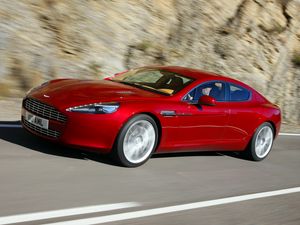 Preview wallpaper aston martin, rapide, 2009, red, side view, speed, asphalt