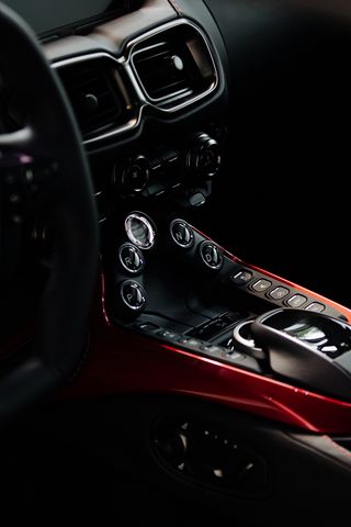 320x480 Wallpaper aston martin, salon, control panel, gearbox, interior