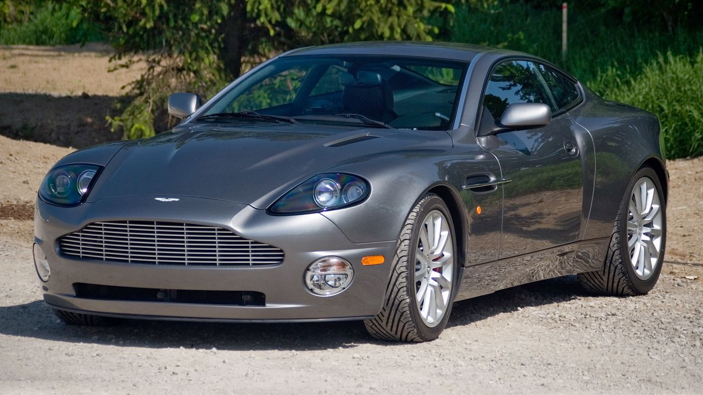 Download wallpaper 1366x768 aston martin, v12, vanquish, 2001, gray ...