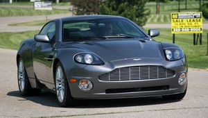 Preview wallpaper aston martin, v12, vanquish, 2001, gray, front view, trees