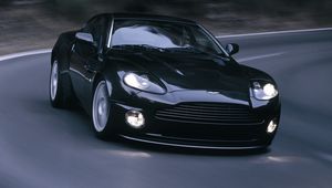 Preview wallpaper aston martin, v12, vanquish, 2004, black, front view, asphalt