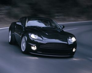 Preview wallpaper aston martin, v12, vanquish, 2004, black, front view, asphalt